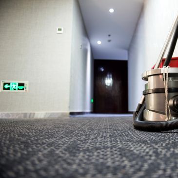 vacuum in a hallway