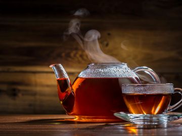 black tea tea pot and tea cup