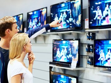 buying tv
purchasing television
TV
Television
Couple picking out television
Man pointing at TV