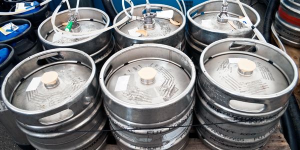 Kegs with attached draft lines.