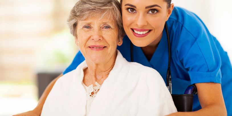 Senior woman with her caregiver