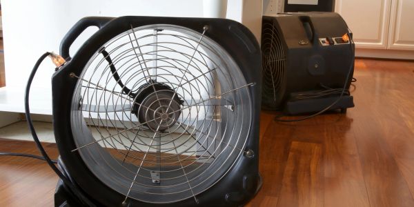 Equipment, airmovers and dehumidifier aid in drying a home
