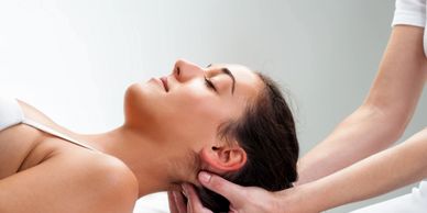 Patient getting their neck massaged