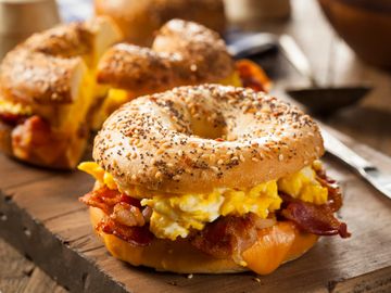 The Classic - bagel, egg, and cheese with bacon, sausage, or ham