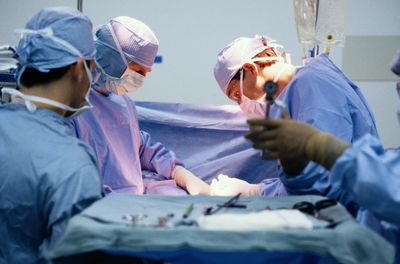 Doctors conducting surgery.