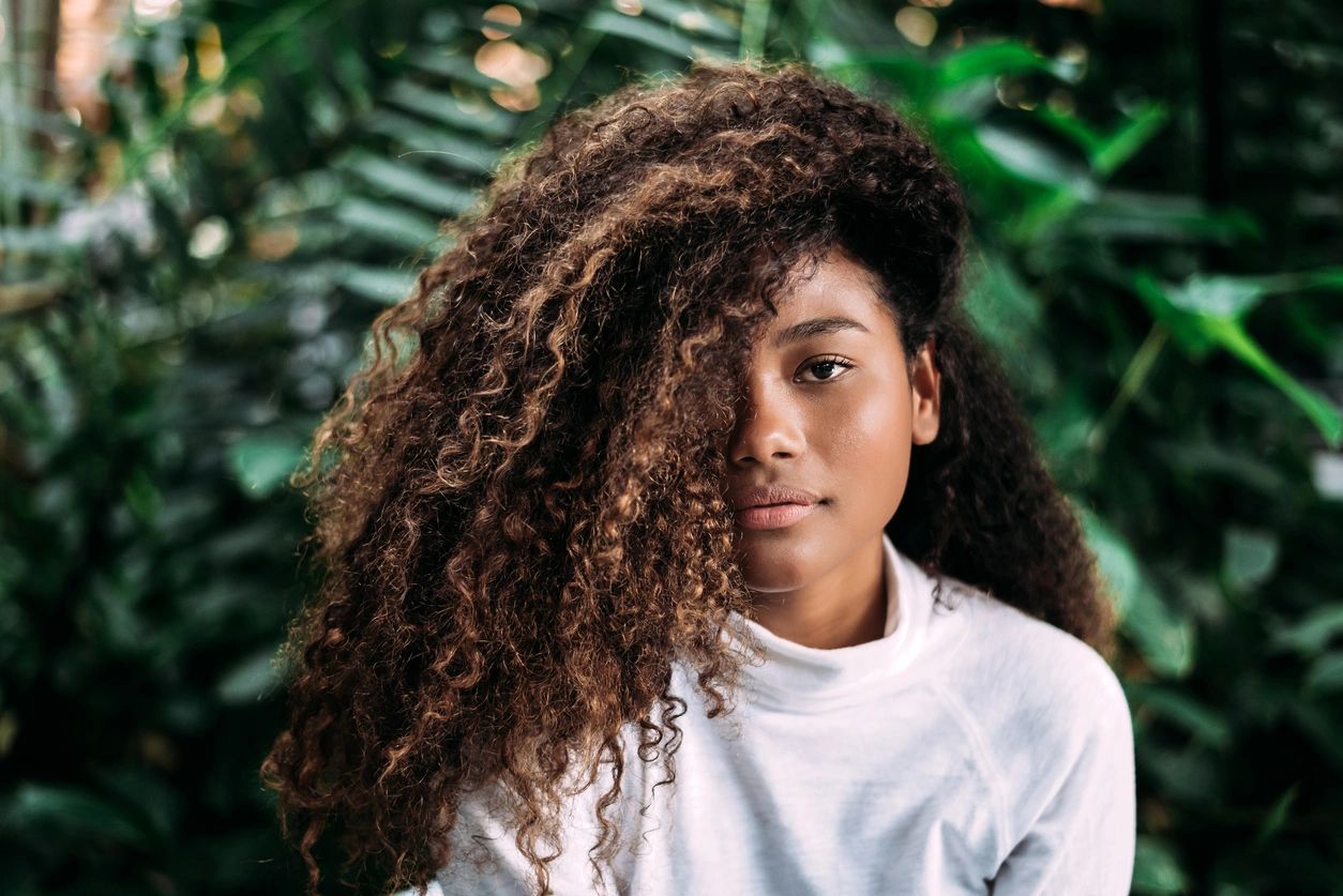 young girl with curly afro-textured hair 