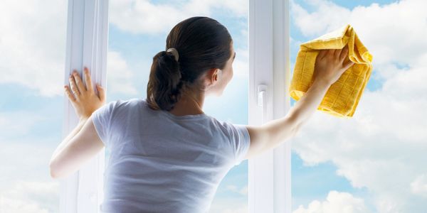 woman cleaning windows 