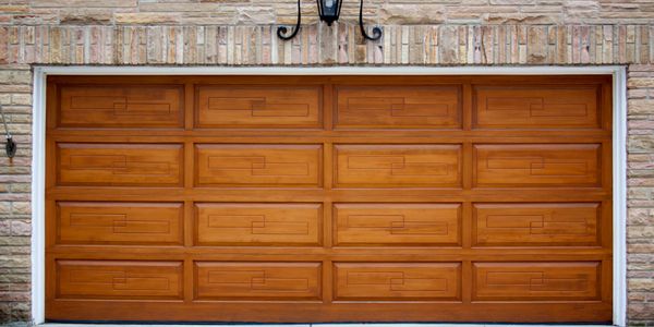 Beautiful look of a wood garage door with the long lasting benefits of a steel garage door.