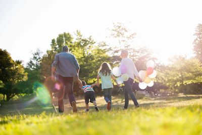 Happy healthy family playing together