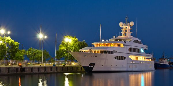 alt="luxury yacht docked in Miami"