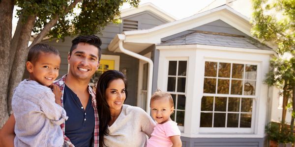 An image of a family that is purchasing a new home. An inspection reduces stress and solves problems