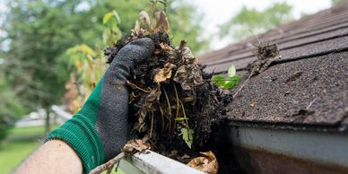 removing dirt from rain gutters