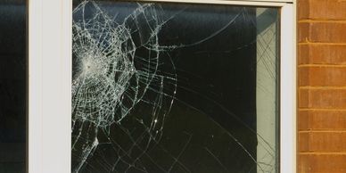 Criminal damage to a window with smashed glass