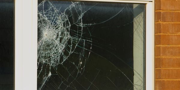 shattered glass with security film