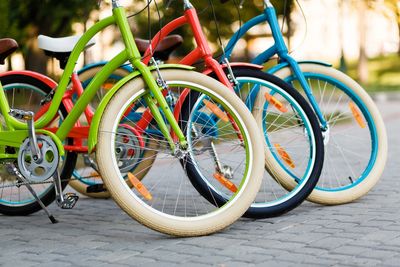 A collection of colourful bicycles lined up.