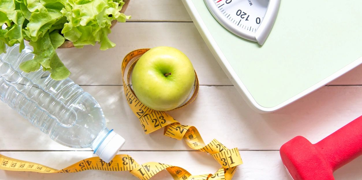 Keeping health in mind while having Water, apple, and weight devices.