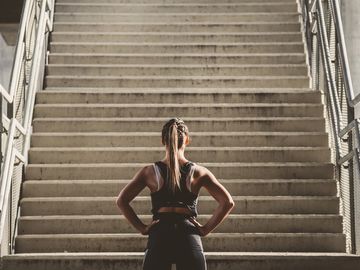 Fit women at the bottom of stairs
