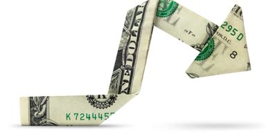 Dollar Bill folded as an arrow 