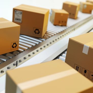 packages moving down a warehouse line