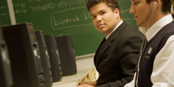 Two students in computer class
