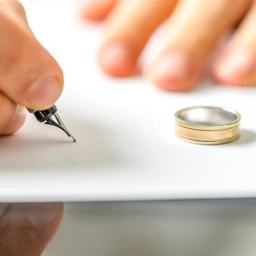 Someone signing separation or divorce document