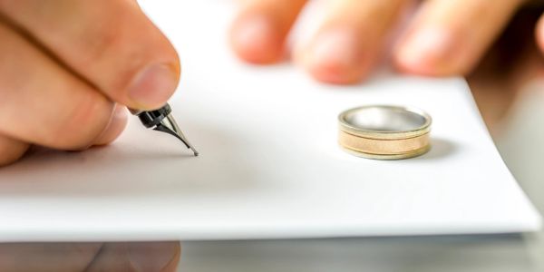 Wedding Ring on a table representing Mediation Services