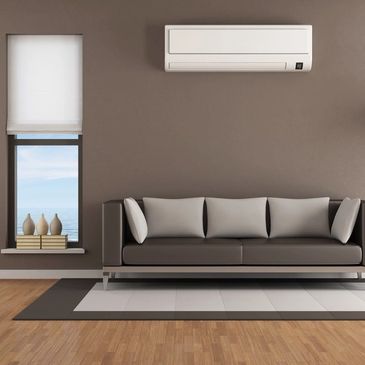 a living room with a wall-mounted AC
