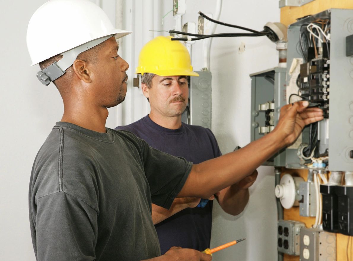 King Electrical crew repairing circuit panel