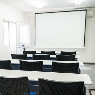 Lecture theatre with chairs facing board