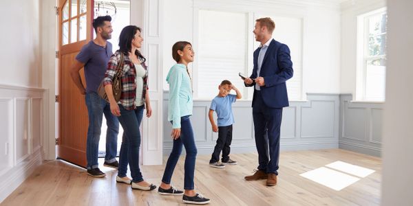 A real estate agent with a family