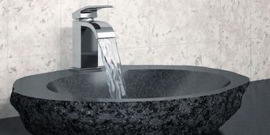 Water from modern lav faucet into modern lav