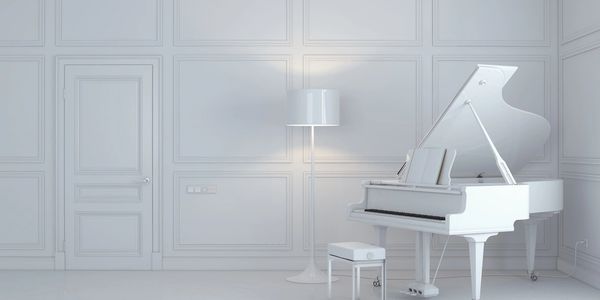 White wall and white piano.