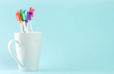Photo of cup holding toothbrushes
