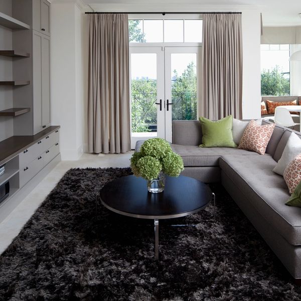 A living room with an area rug