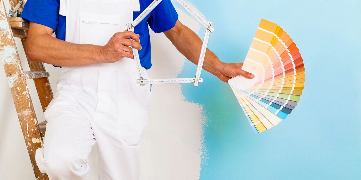 Painter holding Paint swatches