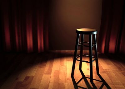 stool on an empty stage