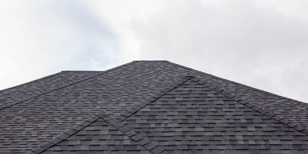 A gray shingled roof top.