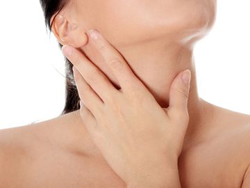 hand on neck thyroid