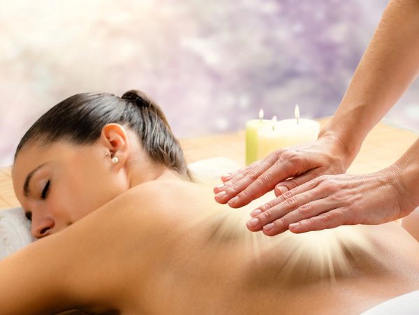 woman having energy massage