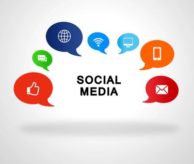 The word social media with multiple icons. The icons are from left to right: A thumbs up, a text mes
