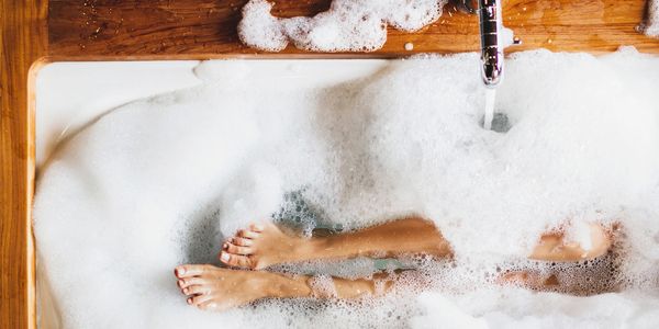 Unwind the day with a bubble bath in a new tub and faucet installed by Appleseed.