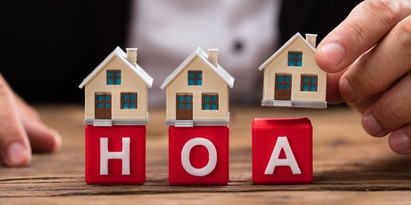 HOA letters with house on top of each letter