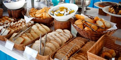 Variety of bread and pickles on display.