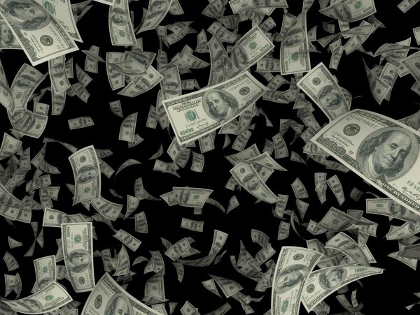 Money bills falling in the air