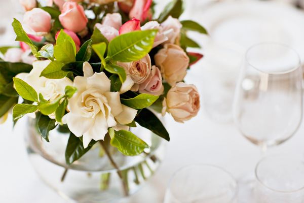 Elegant bouquet of mixed roses in vase.