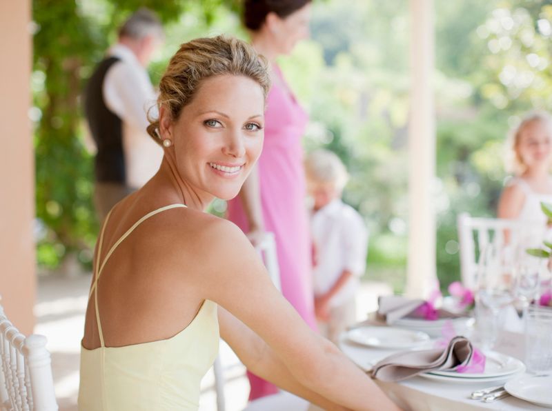 Woman enjoying wedding reception