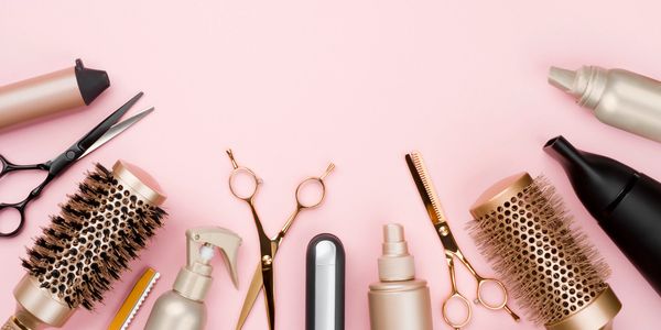 Salon tools on a pink background  