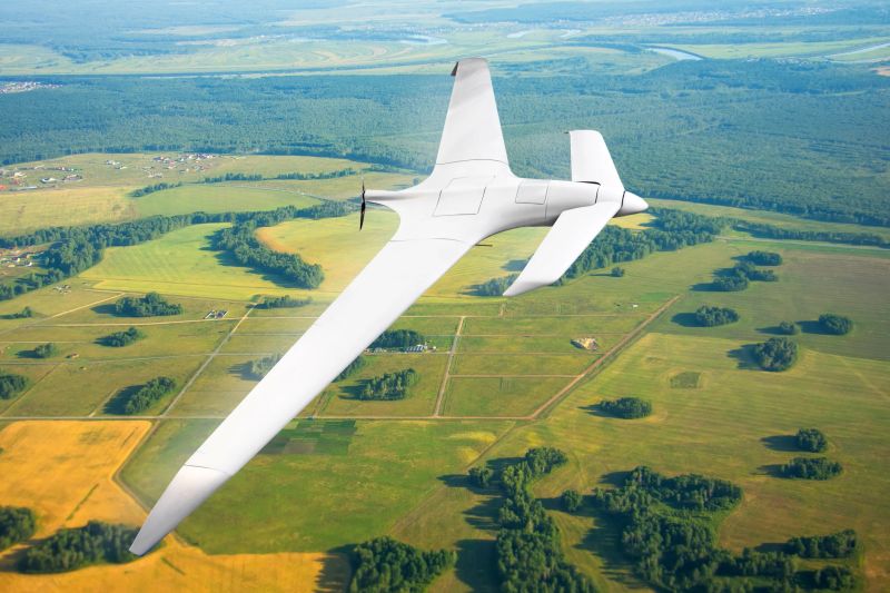 Unmanned military drone on patrol air territory at low altitude