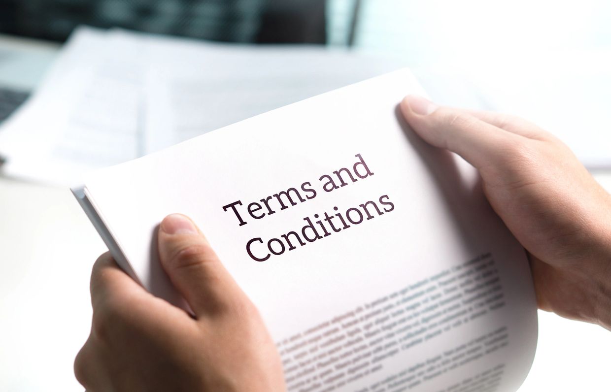 Terms and conditions outlining service scope and client obligations