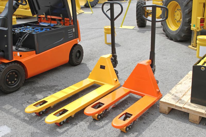 Two Pump Trucks Pallet Jacks Forklifts